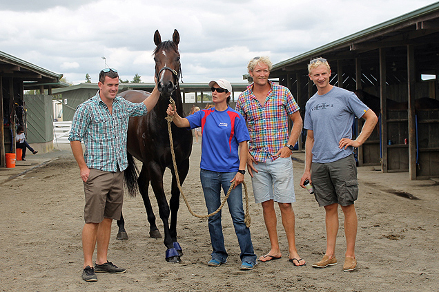 Aotearower with with rowers Joseph Sullivan, Eric Murray & Hamish Bond.