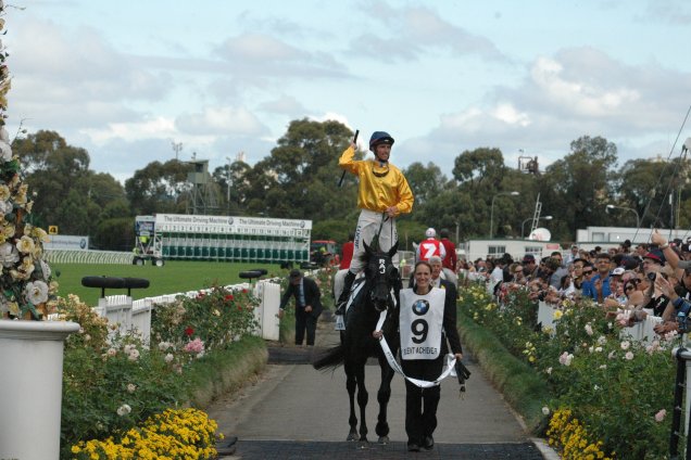 Silent Achiever and handler Naima Kermarrec return to scale after the Gr.1 BMW (2400m) with rider Nash Rawiller.<br />