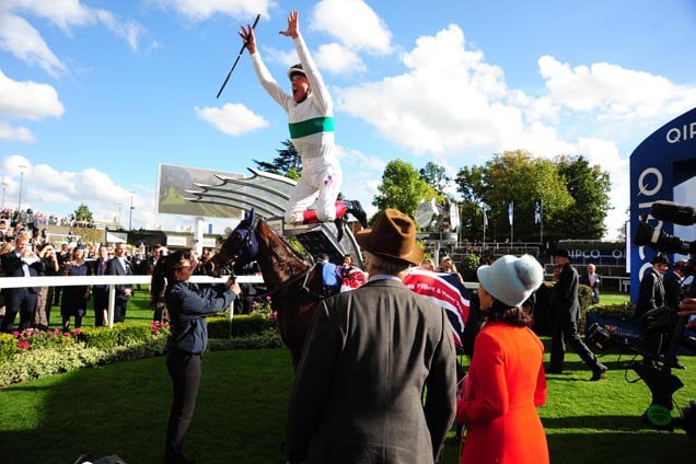 Journey and Frankie Dettori watched by owner George Strawbridge in the winners enclosure.