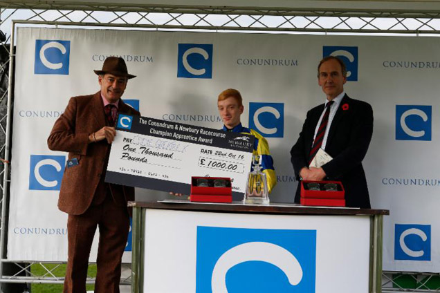 Eddie Greatrex receives a cheque for 1,000 from Mark Coreth (left) after winning the Conundrum HR Champion Apprentice Award