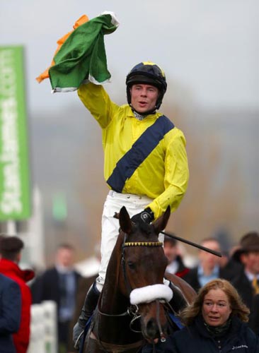 Tully East (Denis O'Regan up) after winning the Close Brothers Novices' Handicap Chase