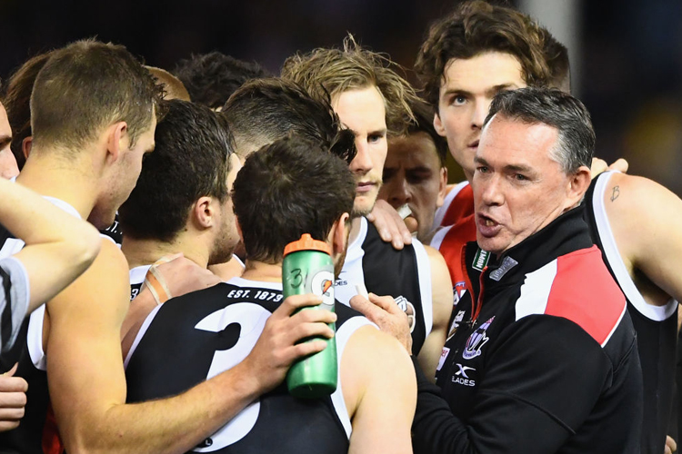 Saints head coach ALAN RICHARDSON talks to his players during the AFL match between the St Kilda Saints and the West Coast Eagles at Etihad Stadium in Melbourne, Australia.