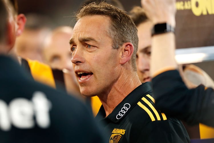 ALASTAIR CLARKSON, Senior Coach of the Hawks addresses his players during the 2017 AFL match between the Collingwood Magpies and the Hawthorn Hawks at the MCG in Melbourne, Australia.