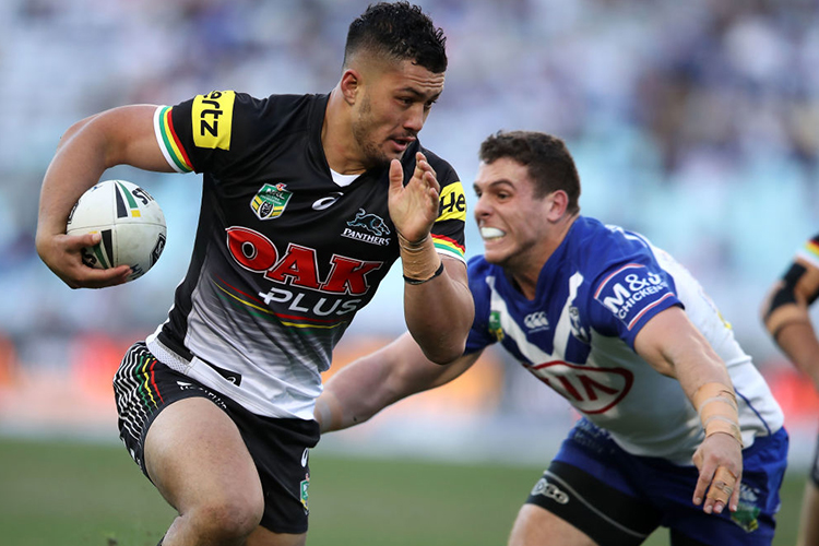 COREY HARAWIRA-NAERA of the Panthers breaks away to score a try during the NRL match between the Canterbury Bulldogs and the Penrith Panthers at ANZ Stadium in Sydney, Australia.