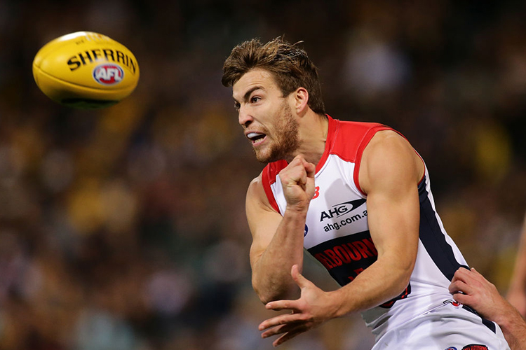 JACK VINEY of the Demons handpasses the ball during the AFL match between the West Coast Eagles and the Melbourne Demons at Domain Stadium in Perth, Australia.