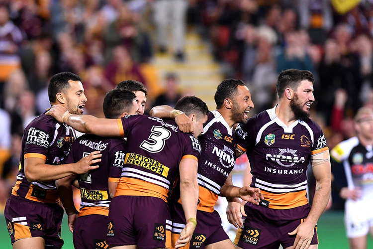 BRISBANE, AUSTRALIA - SEPTEMBER 15: James Roberts of the Broncos is congratulated by team mates after scoring a try during the NRL Semi Photo by Bradley Kanaris/Getty Image