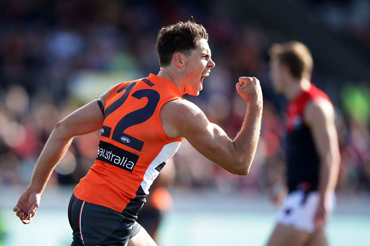 JOSH KELLY of the Giants celebrates a goal during the AFL match between the Greater Western Sydney Giants and the Melbourne Demons at UNSW Canberra Oval in Canberra, Australia.
