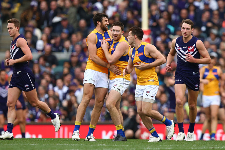JOSH KENNEDY and Jeremy McGovern of the Eagles celebrate a goal during the AFL match between the Fremantle Dockers and the West Coast Eagles at Domain Stadium in Perth, Australia.