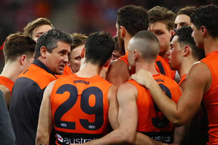 Giants coach, LEON CAMERON is talks to players during the AFL match between the Greater Western Sydney Giants and the Sydney Swans at Spotless Stadium in Sydney, Australia.