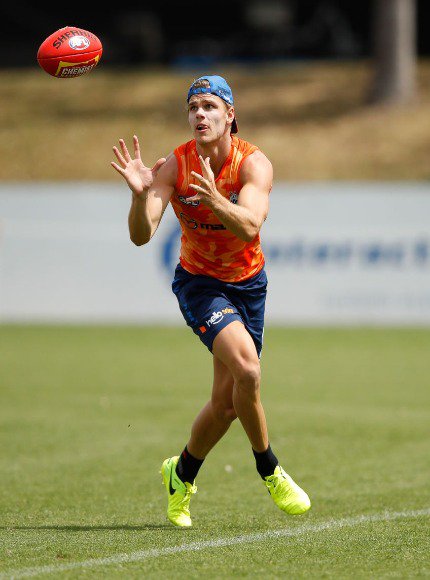 MASON WOOD of the Kangaroos marks the ball during the North Melbourne Kangaroos training session at Arden Street in Australia.