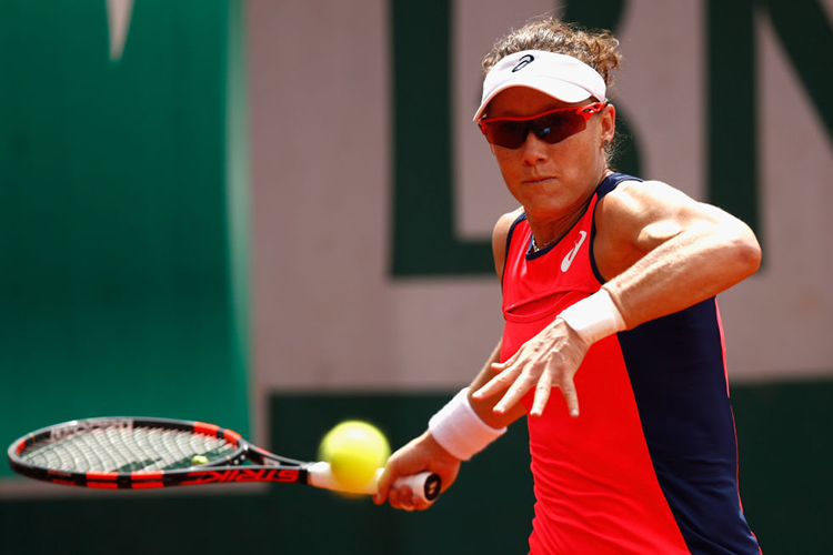 SAMANTHA STOSUR of Australia plays a forehand during the ladies singles match of the 2017 French Open at Roland Garros in Paris, France.