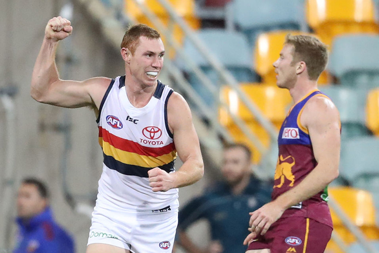 TOM LYNCH of the Crows celebrates after kicking a goal during the AFL match between the Brisbane Lions and the Adelaide Crows at The Gabba in Brisbane, Australia.