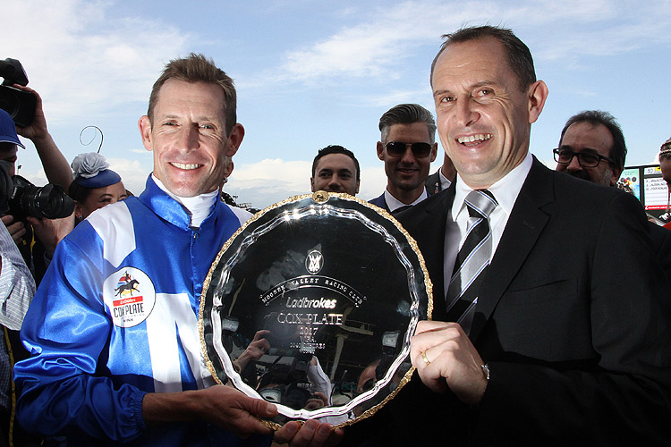 Hugh Bowman and Chris Waller with the Cox Plate trophy Hugh Bowman and Chris Waller with the Cox Plate trophy