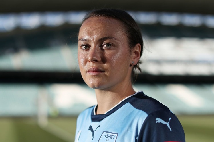 CAITLIN FOORD poses after re-signing with Sydney FC at Allianz Stadium in Australia.