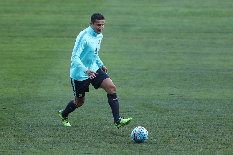 TIM CAHILL passes during an Australia Socceroos training session at ANZ Stadium in Sydney, Australia