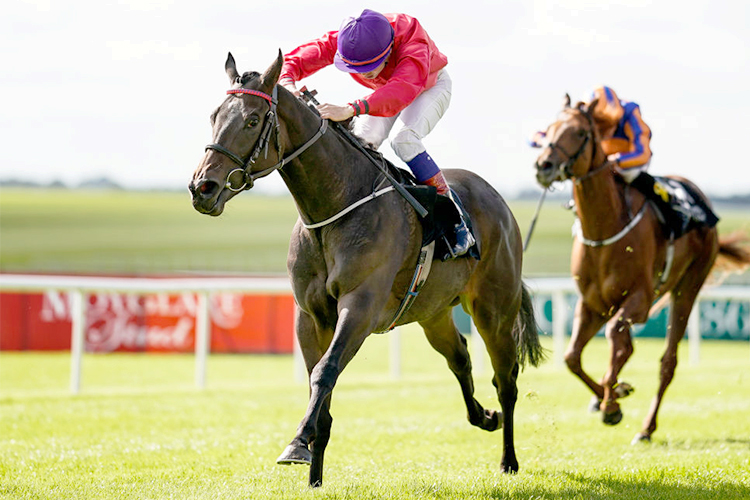 SKITTER SCATTER winning the Moyglare Stud Stakes at Curragh in Kildare, Ireland.