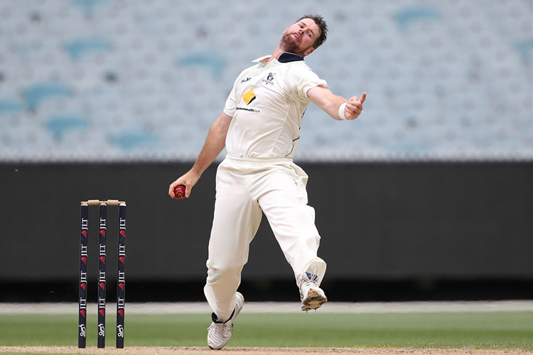 DANIEL CHRISTIAN of Victoria bowls during the Sheffield Shield match between Victoria and Western Australia at the MCG in Melbourne, Australia.