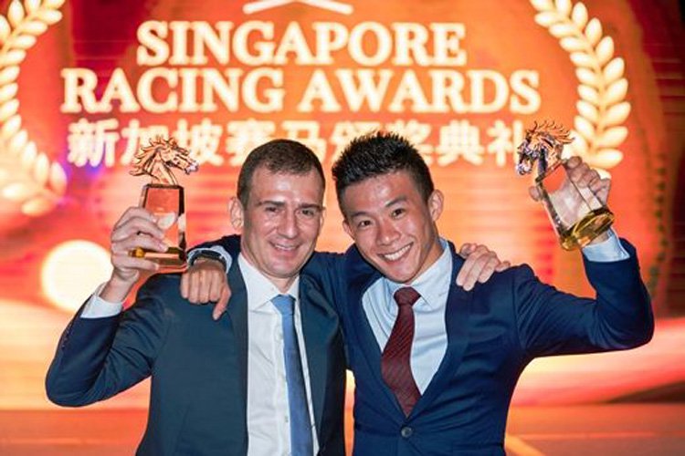 Top hoops whoop it up: Vlad Duric and Wong Chin Chuen raise their trophies to the cameras.