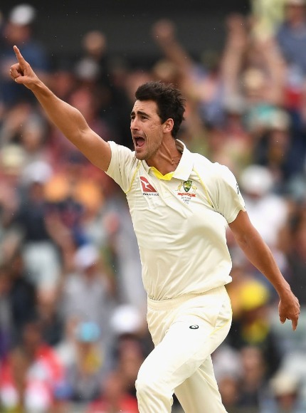MITCHELL STARC of Australia celebrates getting the wicket of James Vince of England during the Third Test match at the WACA in Perth, Australia.