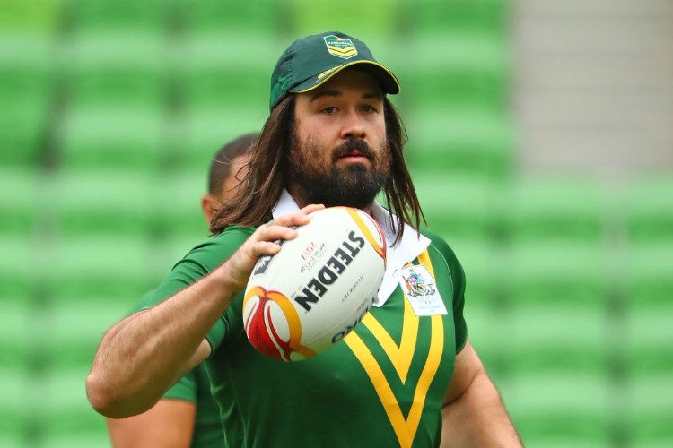 AARON WOODS of the Kangaroos runs with the ball during an Australian Kangaroos training session in Melbourne, Australia.