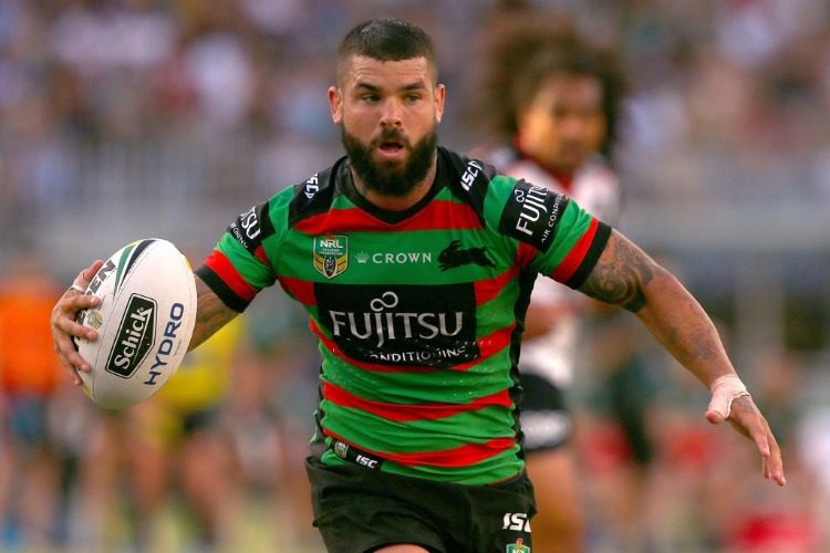 ADAM REYNOLDS of the Rabbitohs runs the ball during the NRL match between the South Sydney Rabbitohs and the New Zealand Warriors at Optus Stadium in Perth, Australia.