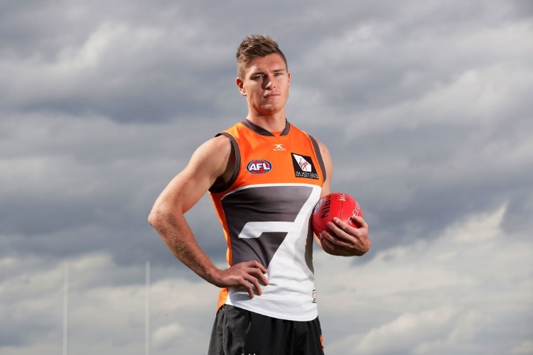 ADAM TOMLINSON of the Giants poses during a Greater Western Sydney Giants AFL training session at WestConnex Centre in Sydney, Australia. ADAM TOMLINSON of the Giants poses during a Greater Western Sydney Giants AFL training session at WestConnex Centre in Sydney, Australia.