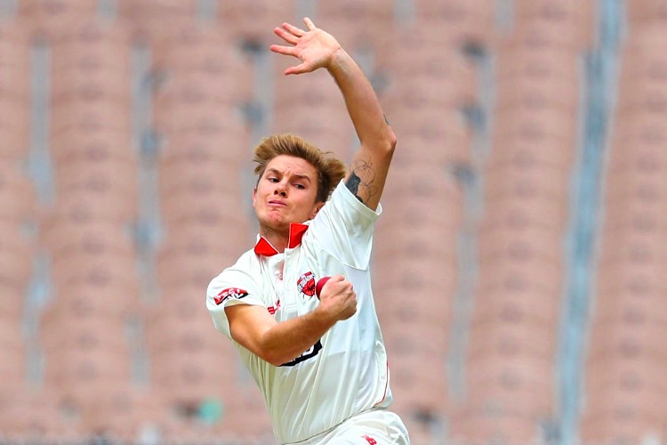 ADAM ZAMPA of South Australia bowls during the Sheffield Shield match between Victoria and South Australia at the MCG in Melbourne, Australia.
