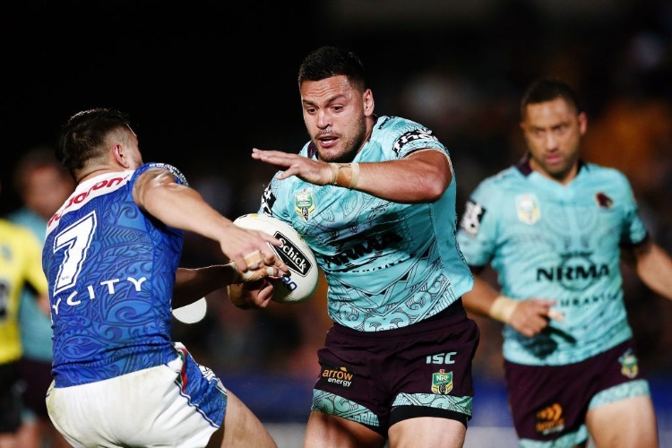 ALEX GLENN of the Broncos makes a run at Shaun Johnson of the Warriors during the NRL match between the New Zealand Warriors and the Brisbane Broncos at Mt Smart Stadium in Auckland, New Zealand.