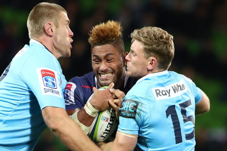 AMANAKI MAFI of the Rebels is tackled during the Super Rugby match between the Rebels and the Waratahs at AAMI Park in Melbourne, Australia. AMANAKI MAFI of the Rebels is tackled during the Super Rugby match between the Rebels and the Waratahs at AAMI Park in Melbourne, Australia.