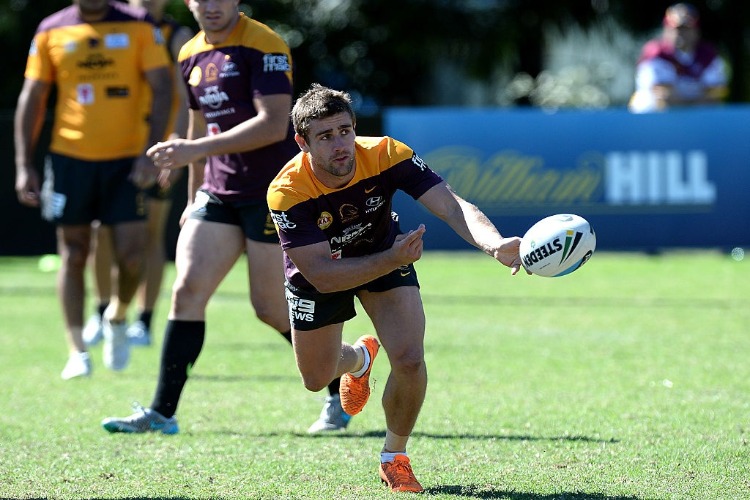 ANDREW MCCULLOUGH passes the ball during a Brisbane Broncos NRL training session in Brisbane, Australia.