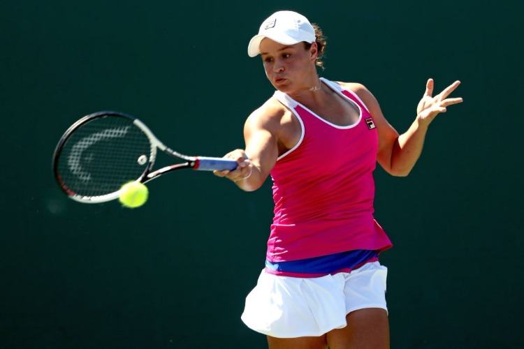 ASHLEIGH BARTY of Australia returns a shot to Claire Liu during the Miami Open Presented by Itau at Crandon Park Tennis Center in Key Biscayne, Florida.