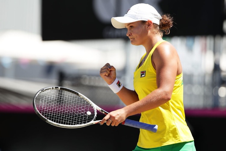 ASHLEIGH BARTY of Australia celebrates winning a point in her singles match against Marta Kostyuk of Ukraine during the Fed Cup tie between Australia and the Ukraine at the Canberra Tennis Centre in Canberra, Australia.