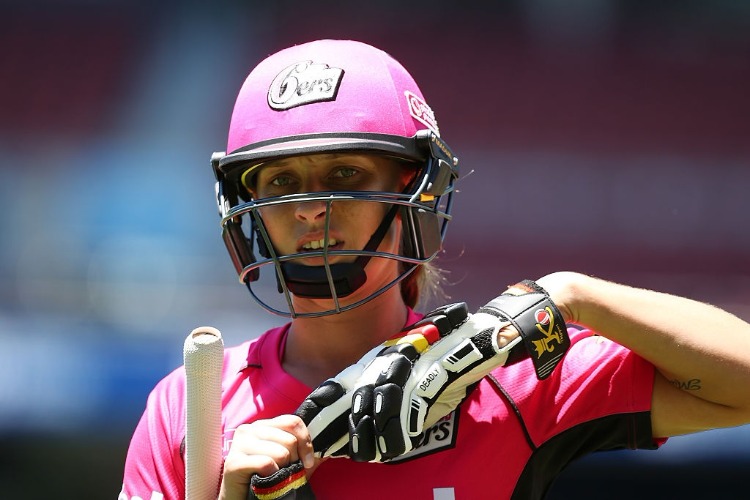 ASHLEIGH GARDNER of the Sydney Sixers looks on during the WBBL match between the Sixers and Strikers in Adelaide, Australia.