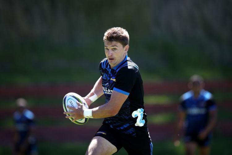 BEAUDEN BARRETT runs the ball during a Hurricanes Super Rugby training session at Rugby League Park in Wellington, New Zealand.