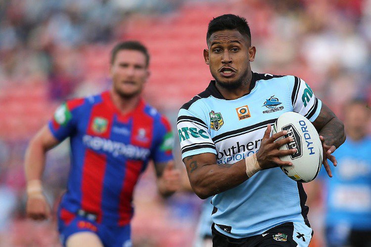 BEN BARBA of the Sharks runs the ball during the NRL match between the Newcastle Knights and the Cronulla Sharks at Hunter Stadium in Newcastle, Australia.