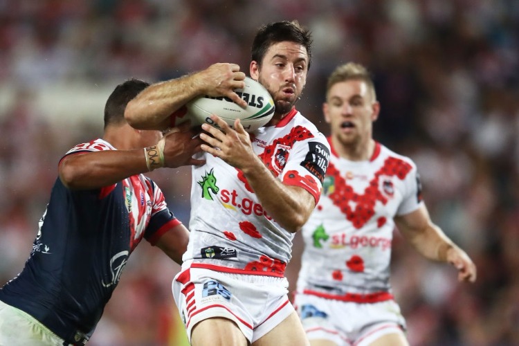 BEN HUNT of the Dragons is tackled during the NRL match between the St George Illawara Dragons and Sydney Roosters at Allianz Stadium in Sydney, Australia.