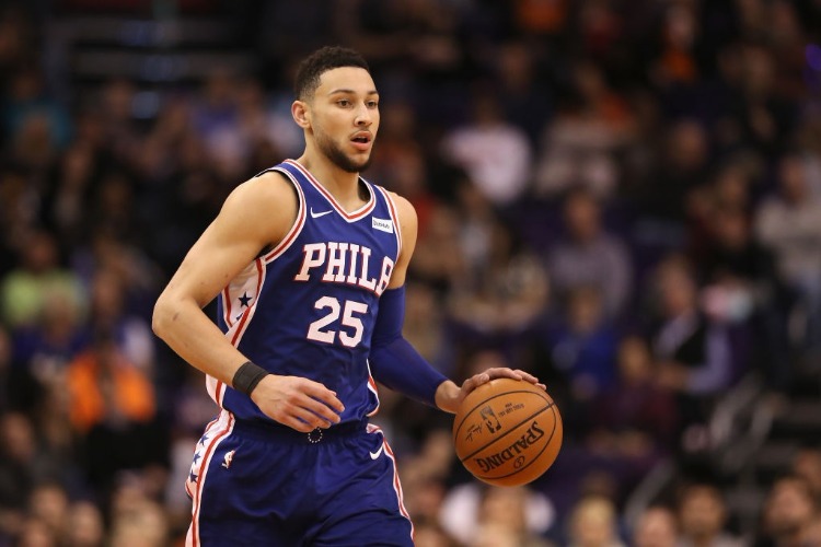 BEN SIMMONS #25 of the Philadelphia 76ers handles the ball during the NBA game against the Phoenix Suns at Talking Stick Resort Arena in Phoenix, Arizona.