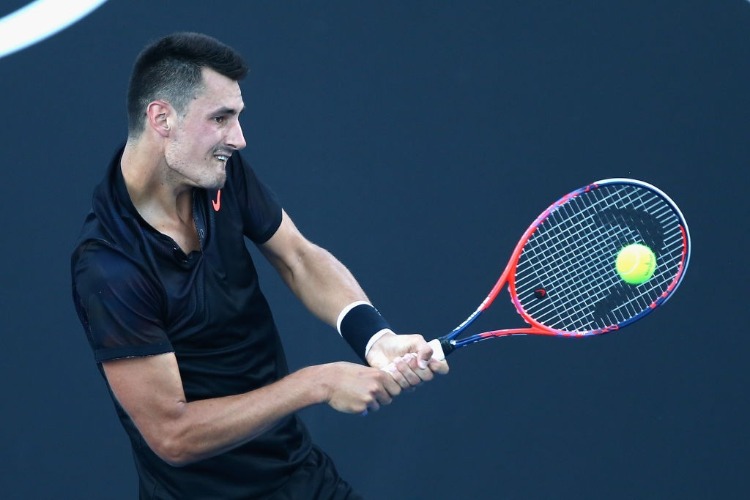 BERNARD TOMIC of Australia competes in his first round match during 2018 Australian Open Qualifying at Melbourne Park in Melbourne, Australia.