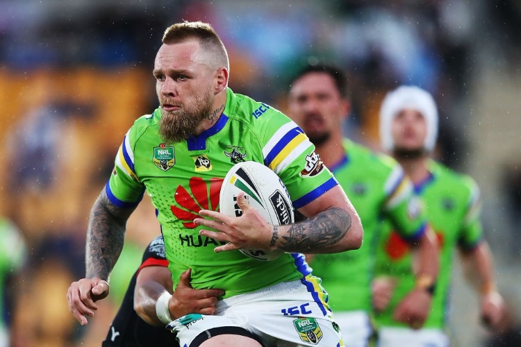 BLAKE AUSTIN of the Raiders charges forward during the NRL match between the New Zealand Warriors and the Canberra Raiders at Mt Smart Stadium in Auckland, New Zealand.
