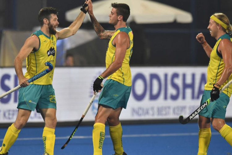 BLAKE GLOVERS of Australia celebrates after scoring during the FIH Men's Hockey World Cup quarter final match between Australia and France at Kalinga Stadium in Bhubaneswar, India.