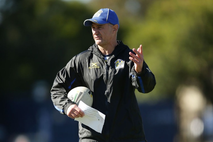 Eels head coach BRAD ARTHUR talks to players during a Parramatta Eels NRL training session in Sydney, Australia