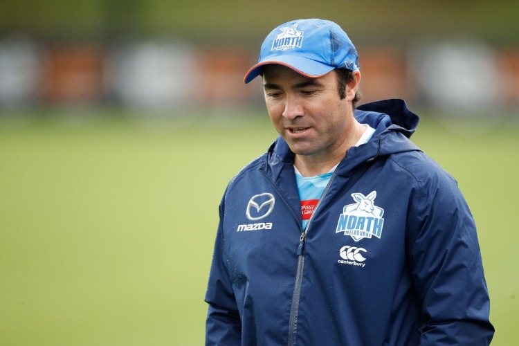 BRAD SCOTT, Senior Coach of the Kangaroos looks on during the North Melbourne Kangaroos training session at Arden St in Melbourne, Australia.