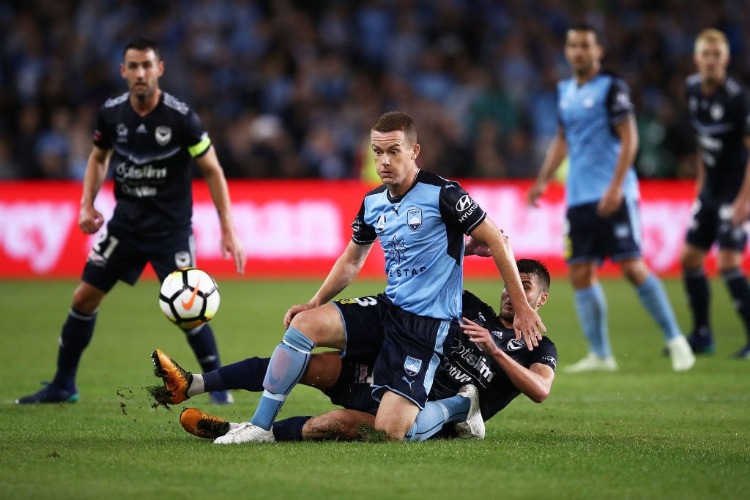 BRANDON O'NEILL of Sydneycompetes with Terry Antonis of the Victory during the A-League Semi Final match between Sydney FC and Melbourne Victory at Allianz Stadium in Sydney, Australia.