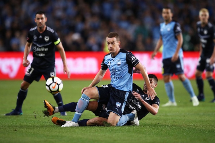 BRANDON O'NEILL of Sydneycompetes with Terry Antonis of the Victory during the A-League Semi Final match between Sydney FC and Melbourne Victory at Allianz Stadium in Sydney, Australia. BRANDON O'NEILL of Sydneycompetes with Terry Antonis of the Victory during the A-League Semi Final match between Sydney FC and Melbourne Victory at Allianz Stadium in Sydney, Australia.