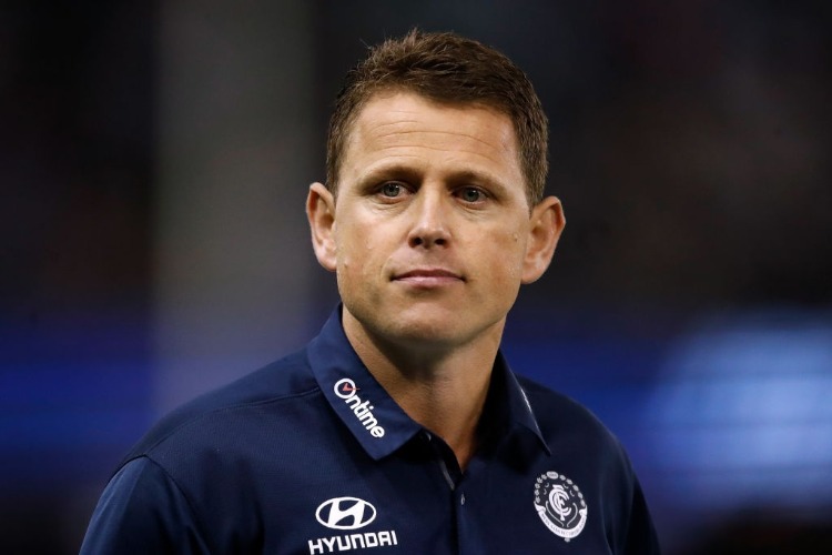 BRENDON BOLTON, Senior Coach of the Blues looks on during the AFL match between the Western Bulldogs and the Carlton Blues at Etihad Stadium in Melbourne, Australia.