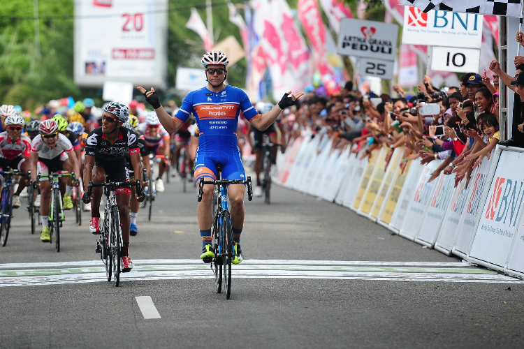 BRENTON JONES of Avanti Racing Team Australia reacts as he crosses the finish line to win stage 9 during stage 9 of the 2014 Tour in Padang, Indonesia. BRENTON JONES of Avanti Racing Team Australia reacts as he crosses the finish line to win stage 9 during stage 9 of the 2014 Tour in Padang, Indonesia.