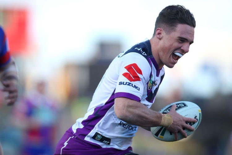 BRODIE CROFT of the Storm scores a try during the NRL match between the Newcastle Knights and the Melbourne Storm at McDonald Jones Stadium in Newcastle, Australia.