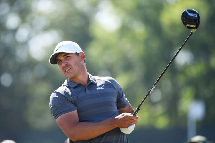 BROOKS KOEPKA of the United States plays his shot from the ninth tee during the 2018 U.S. Open at Shinnecock Hills Golf Club in Southampton, New York.