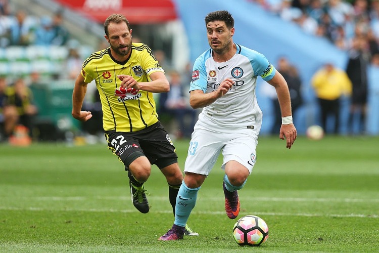BRUNO FORNAROLI of Melbourne City (R) runs with the ball during the A-League match between Melbourne City and Wellington Phoenix at AAMI Park in Melbourne, Australia.
