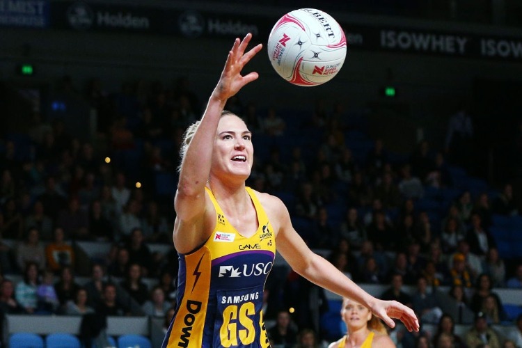 CAITLIN BASSETT of the Lightning gathers the ball during the Super Netball match between the Magpies and the Lightning at Margaret Court Arena in Melbourne, Australia. CAITLIN BASSETT of the Lightning gathers the ball during the Super Netball match between the Magpies and the Lightning at Margaret Court Arena in Melbourne, Australia.